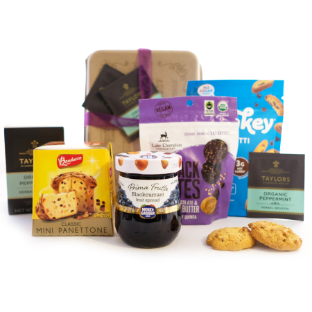 Caja de refrigerios de frutas, pasteles y té