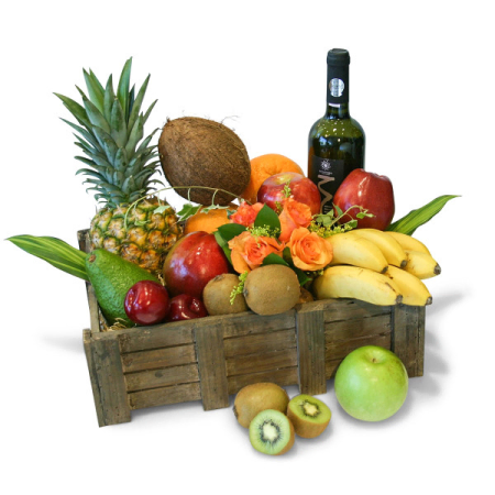 Fruta tropical con caja de vino